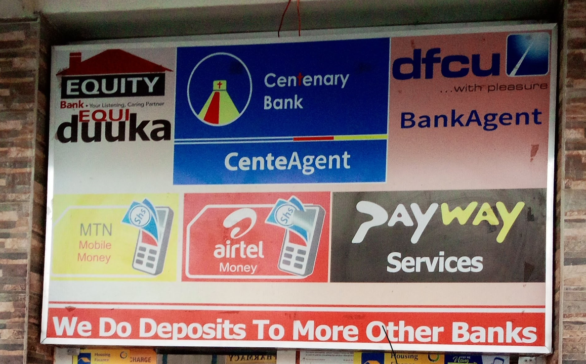 Agent banking signage listing bank and mobile money services