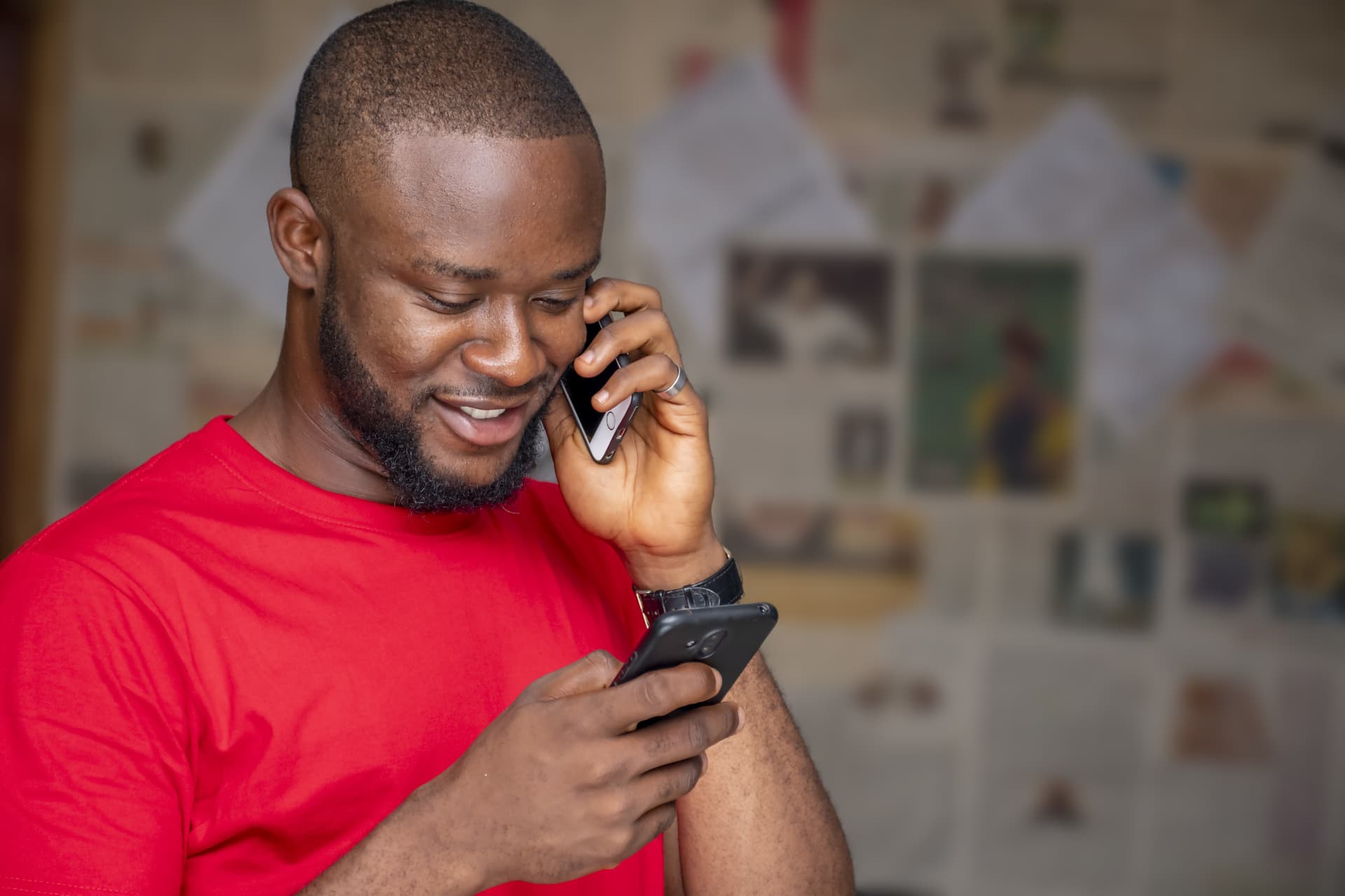 Bank customer using mobile money on the phone